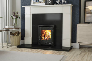 Henley Muckross Eco 4.6kW Multi-Fuel Inset Stove with flames in a fireplace suite on a black hearth