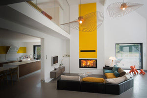 Fondis Ulys 1100XXL black inset stove in a loft house living room