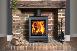 Portway Luxima 5kW Wood Burning Stove in a brick fireplace suite